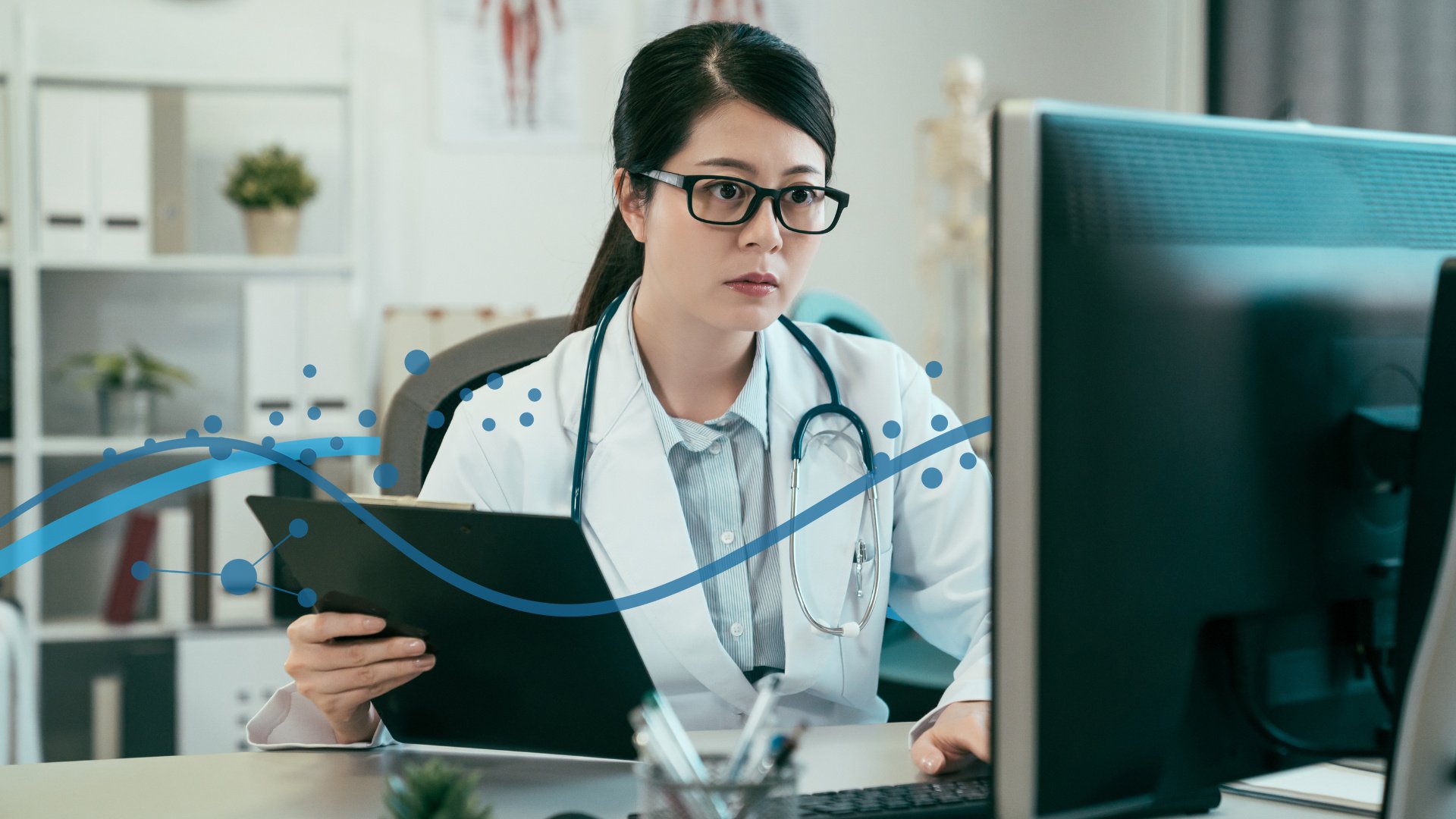 Website Image - Hospitals Page - Doctor On Computer With TDS Elements